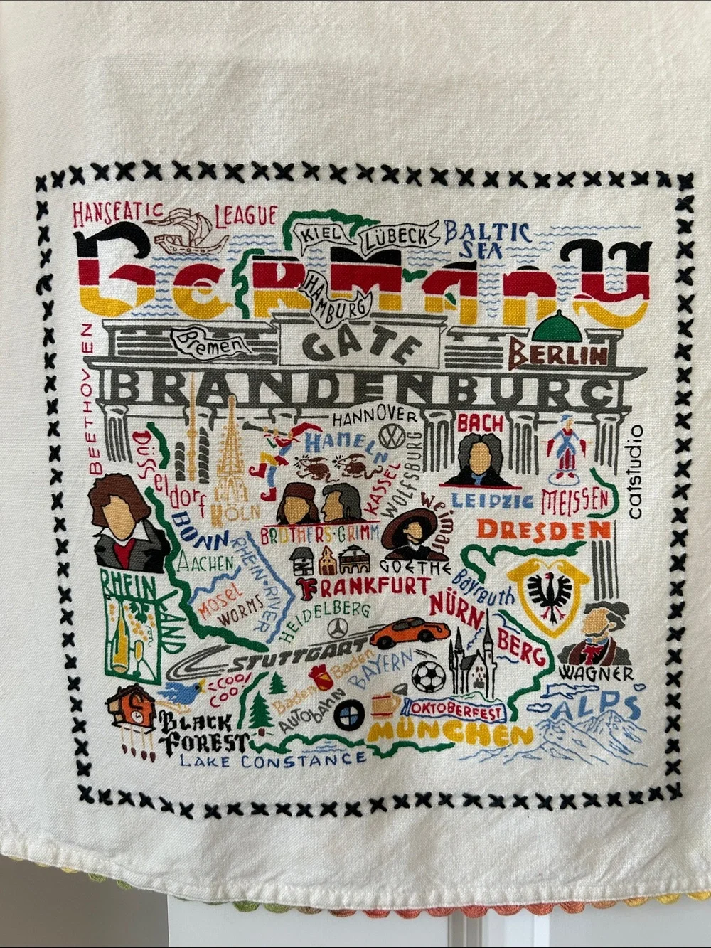 Germany Tea Towel Catstudio with Rickrack Trim. Cotton. Machine Wash.